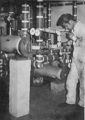 august 1970  mr t shaw checking calorifers  photo hedley jones sm.jpg